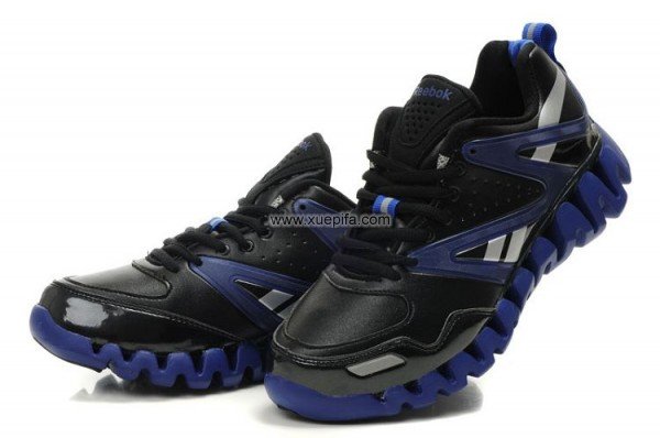 Reebok锐步zig-tech 2012新款毛毛虫皮面黑宝蓝 女